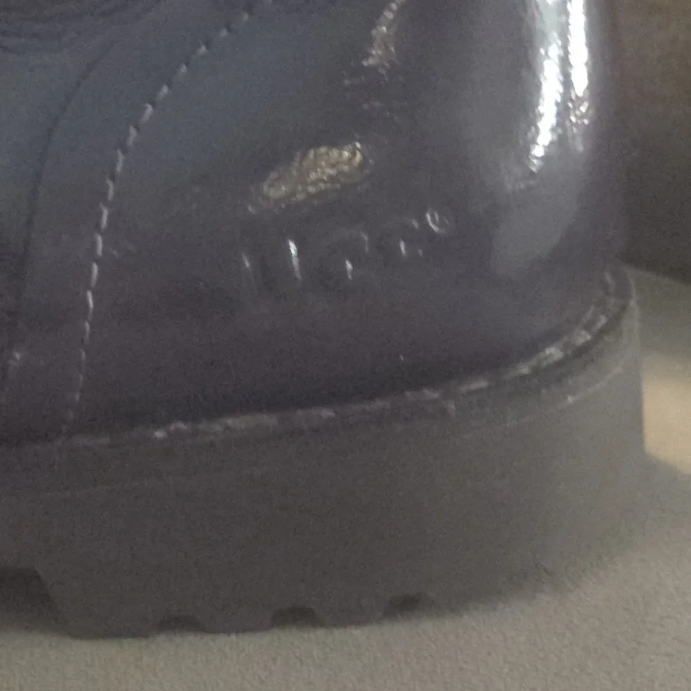 UGG Black Sole Boots
